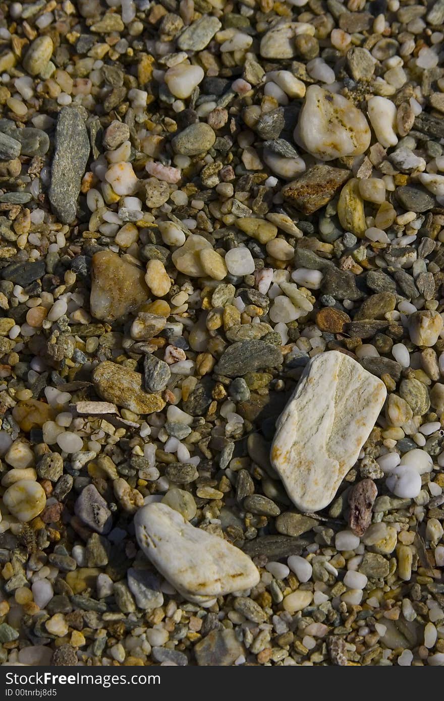 Detail texture of a stoney beach. Detail texture of a stoney beach