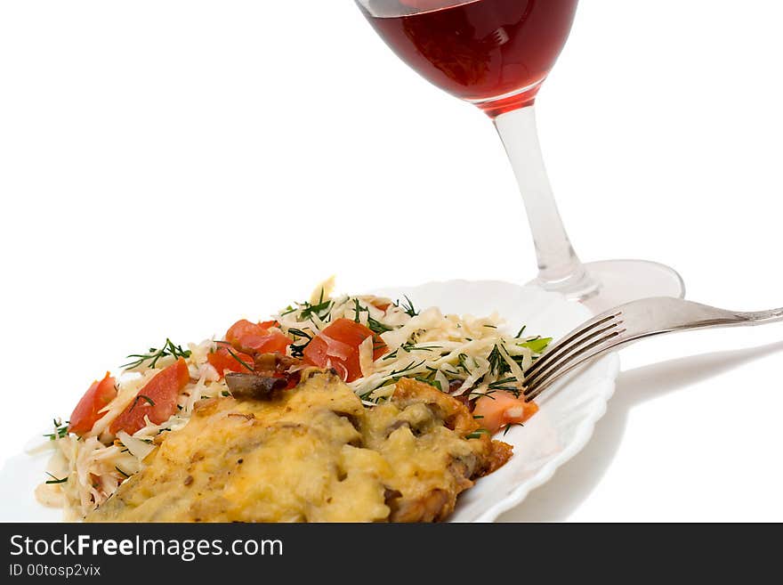 Vegetarian salad and meat on plate, isolated on white