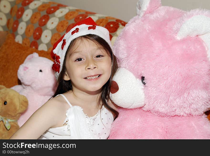 A girl and pink smiling. A girl and pink smiling