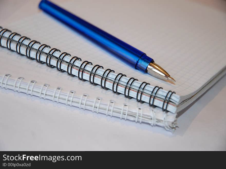 Blue Pen with two notepads. Blue Pen with two notepads