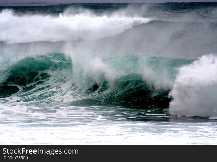 20 up to 25 feet high waves at Pipeline Beach Park, North Shore Oahu, Hawaii