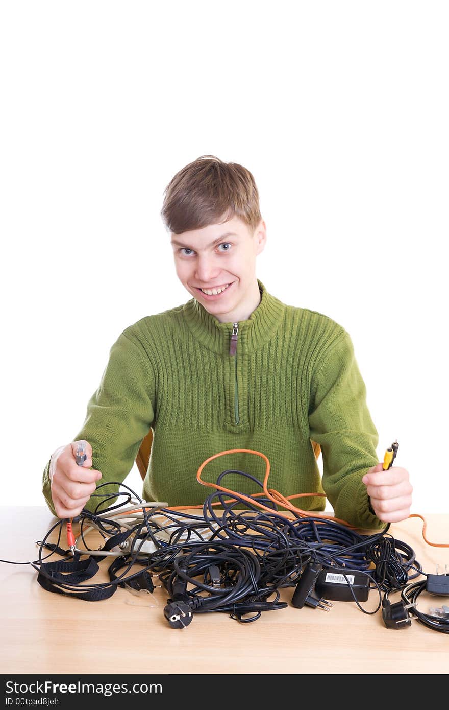 The young guy with cables isolated on a white background