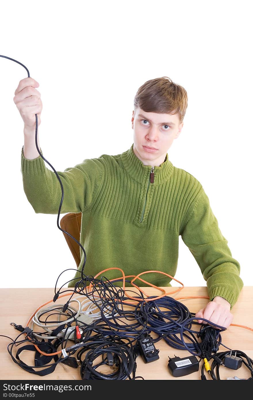 The young guy with cables isolated on a white background