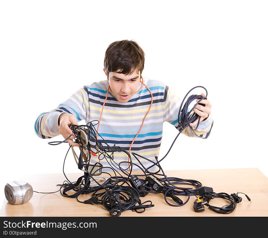 The young guy with cables isolated on a white