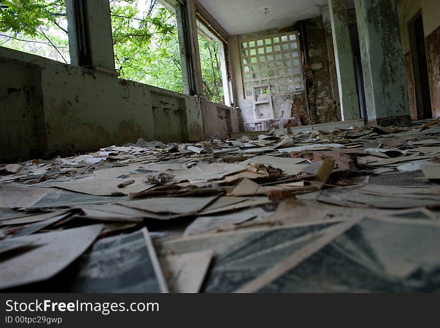 A lot of old post card in a ruined hall. A lot of old post card in a ruined hall