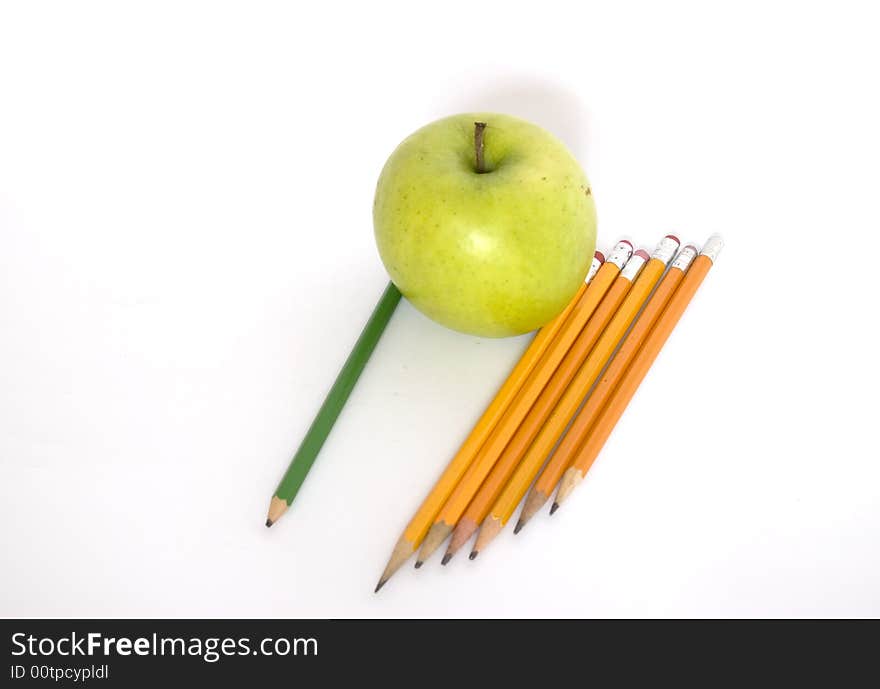 Colorful Pencils And Apple