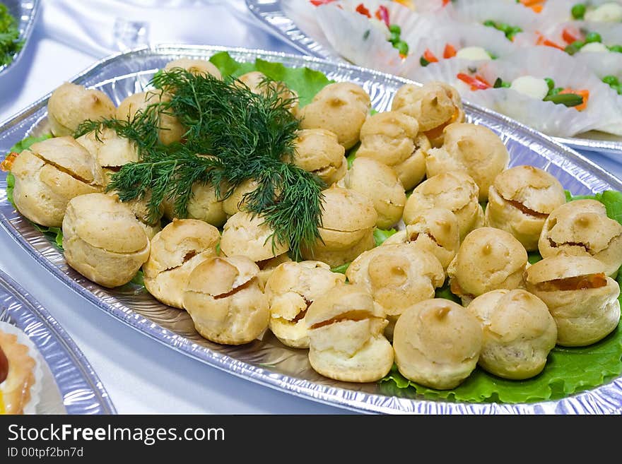 Catering buffet style - buns with caviar on the tray