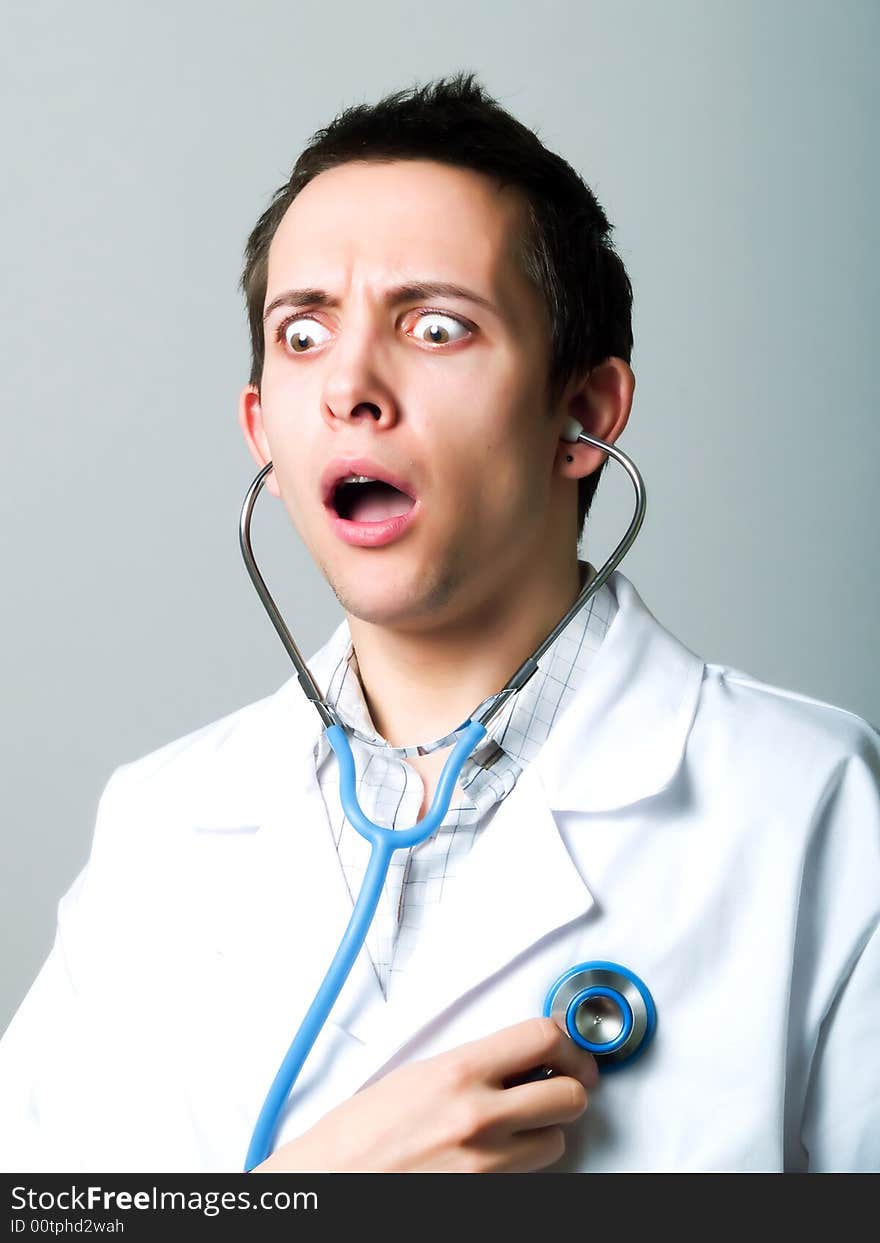 Young doctor using a stethoscope