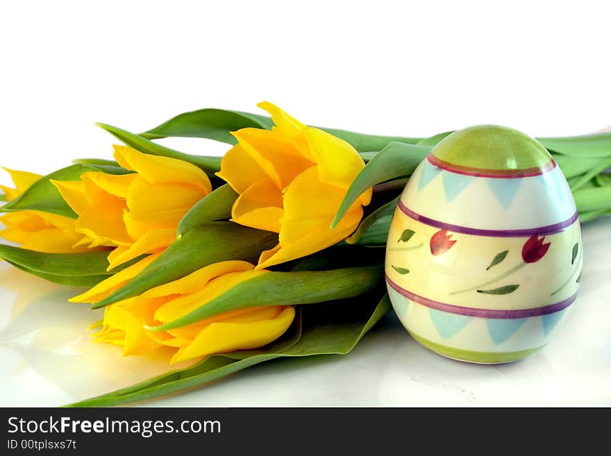 Colorful eggs, easter, yellow tulips