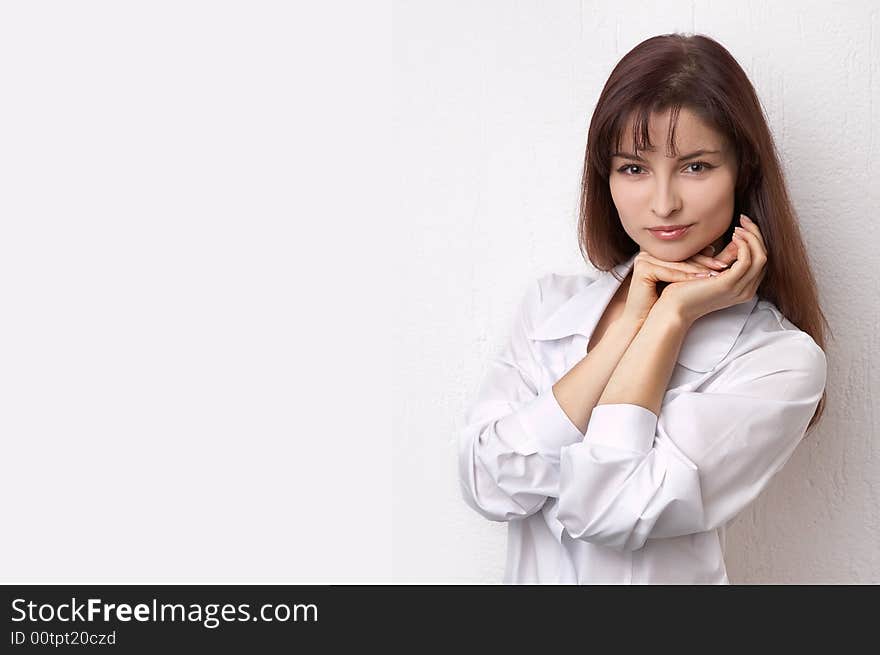 Young woman on the white background