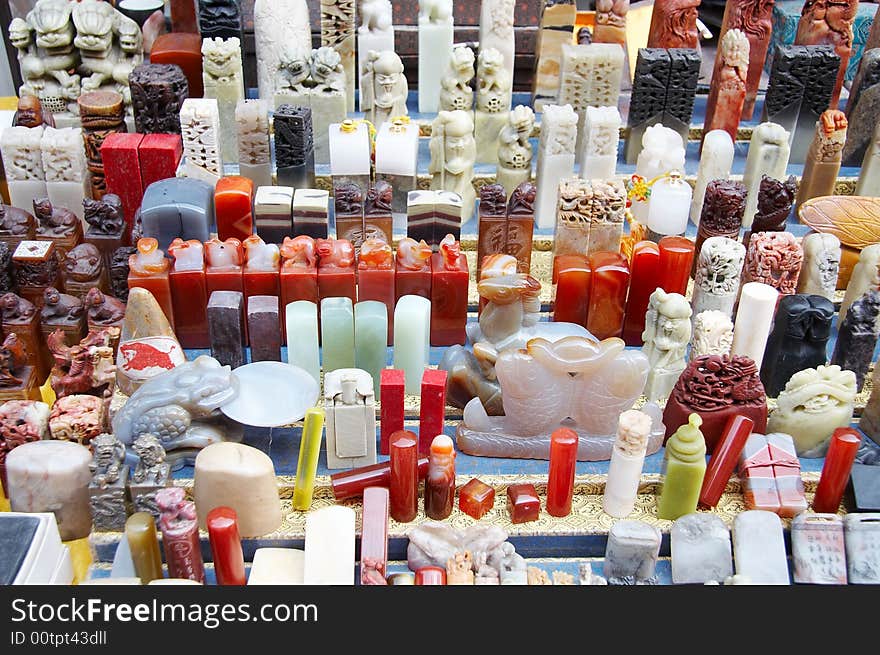 Beijing,China,one of stall of antique market,a lot of chinese carving seals on sale.