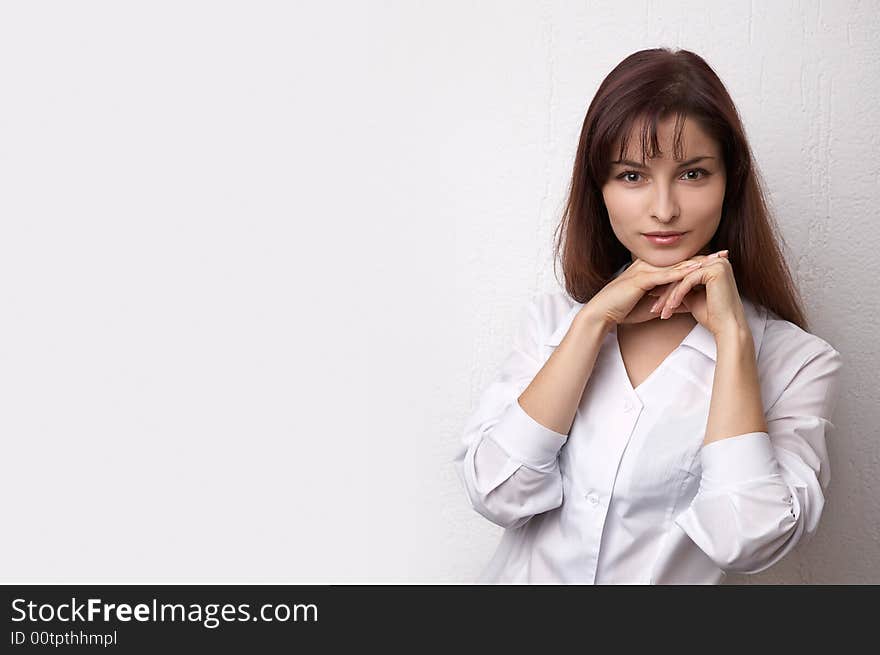 Young woman on the white background