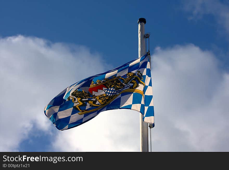 Bavarian flag against the typical blue white sky