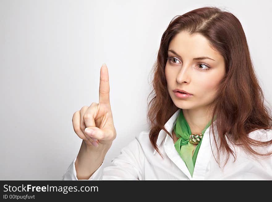 Young woman on the white background