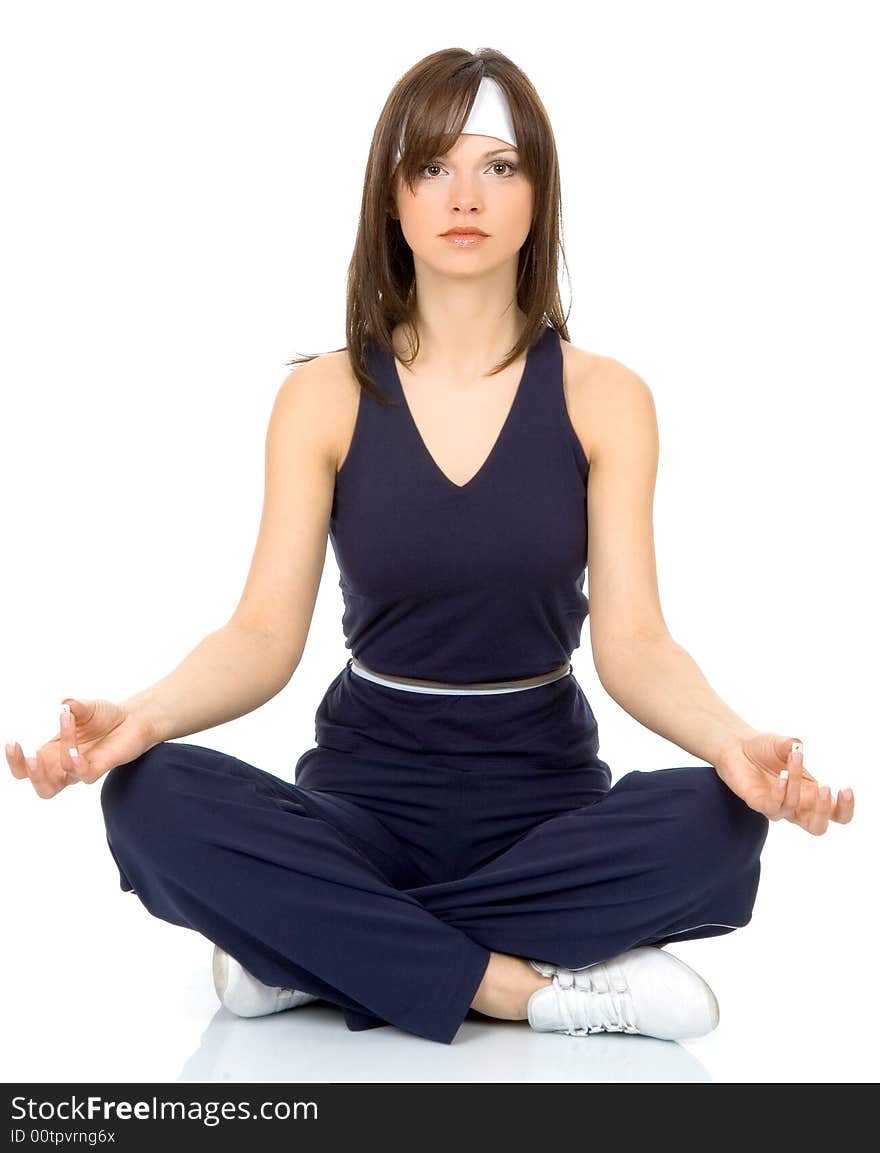 Beautiful brunette doing meditation and relaxing