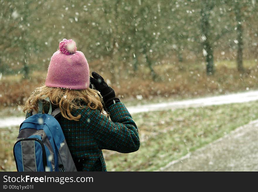 Girl going for a walk in the snow. Girl going for a walk in the snow