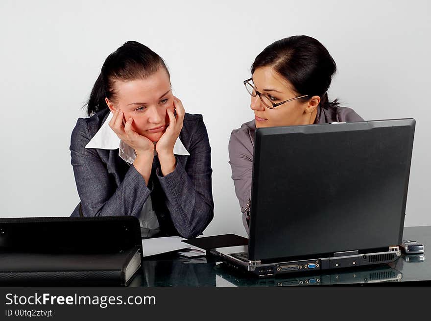 Attractive brunette women  working in office. Attractive brunette women  working in office