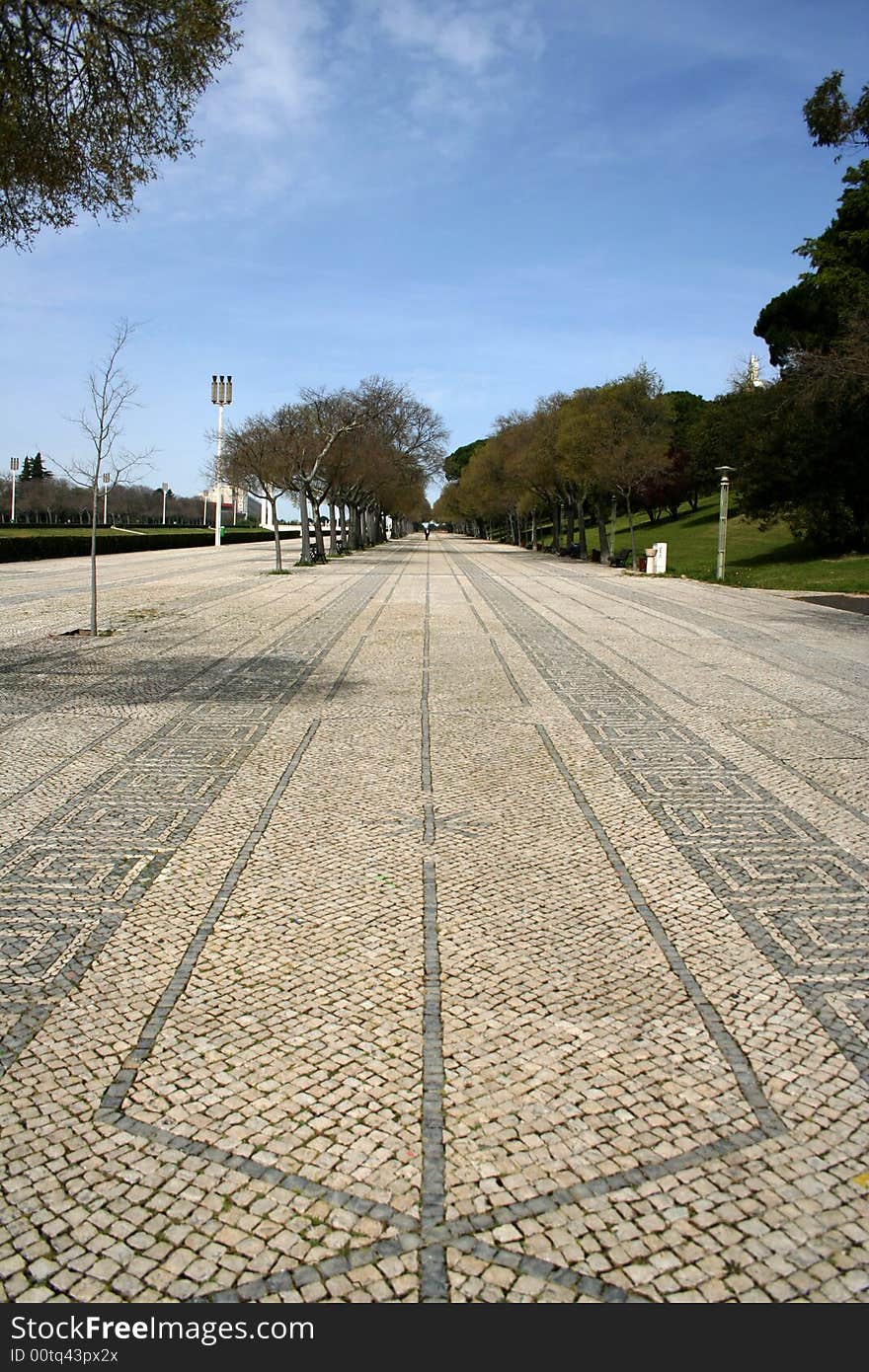 A pavement made out of tiles in Portugal. A pavement made out of tiles in Portugal