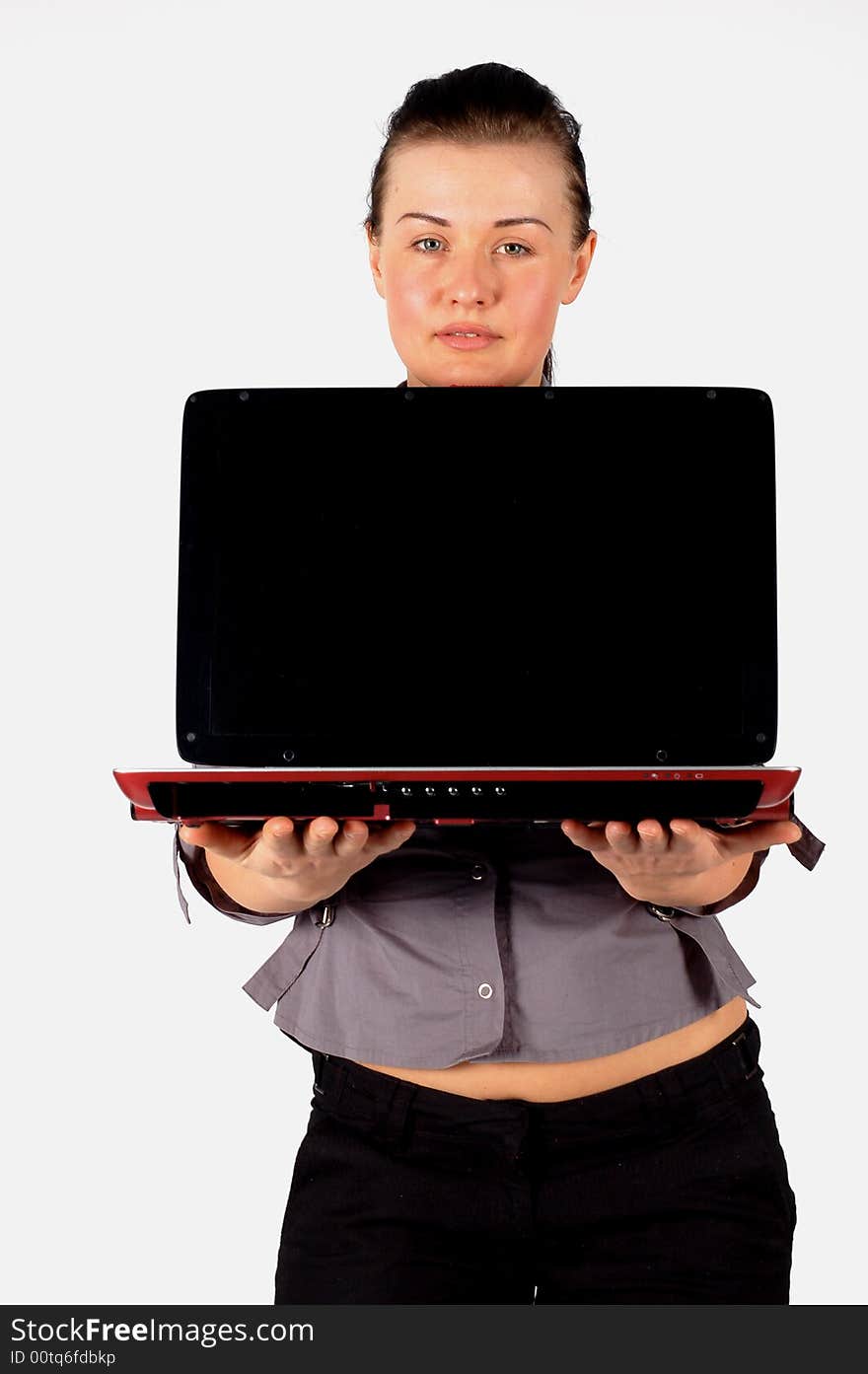 Businesswoman holding laptop