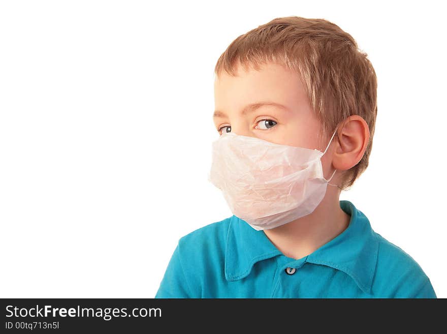 Boy in respirator on a white