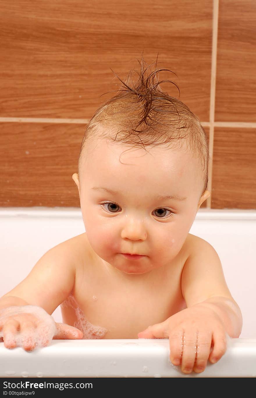 Happy baby girl in bath. Happy baby girl in bath