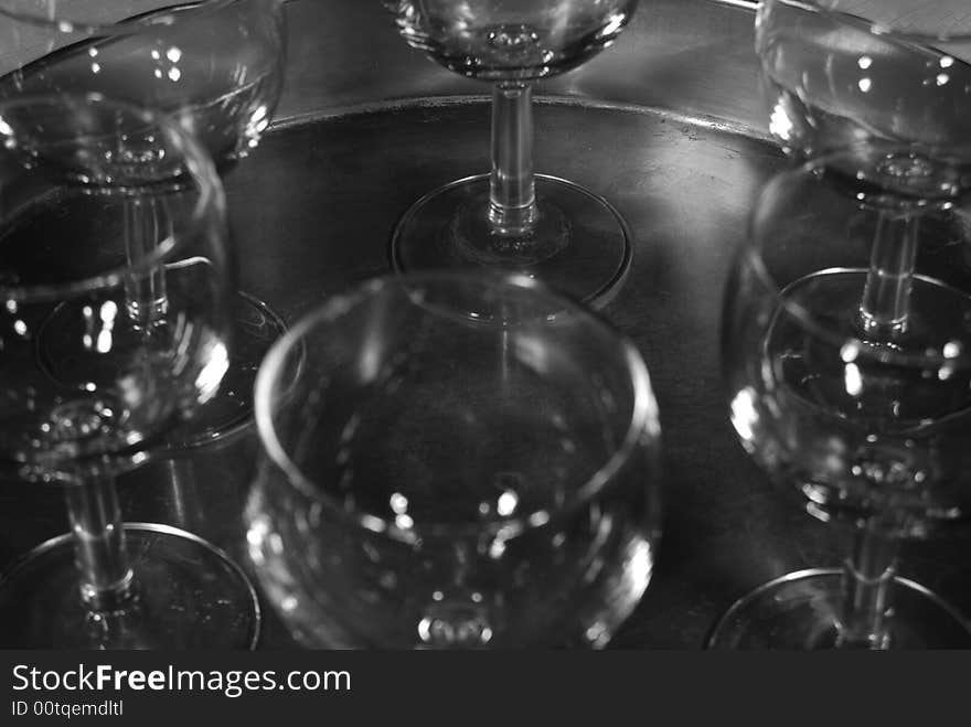 Wineglasses on a plate greyscale