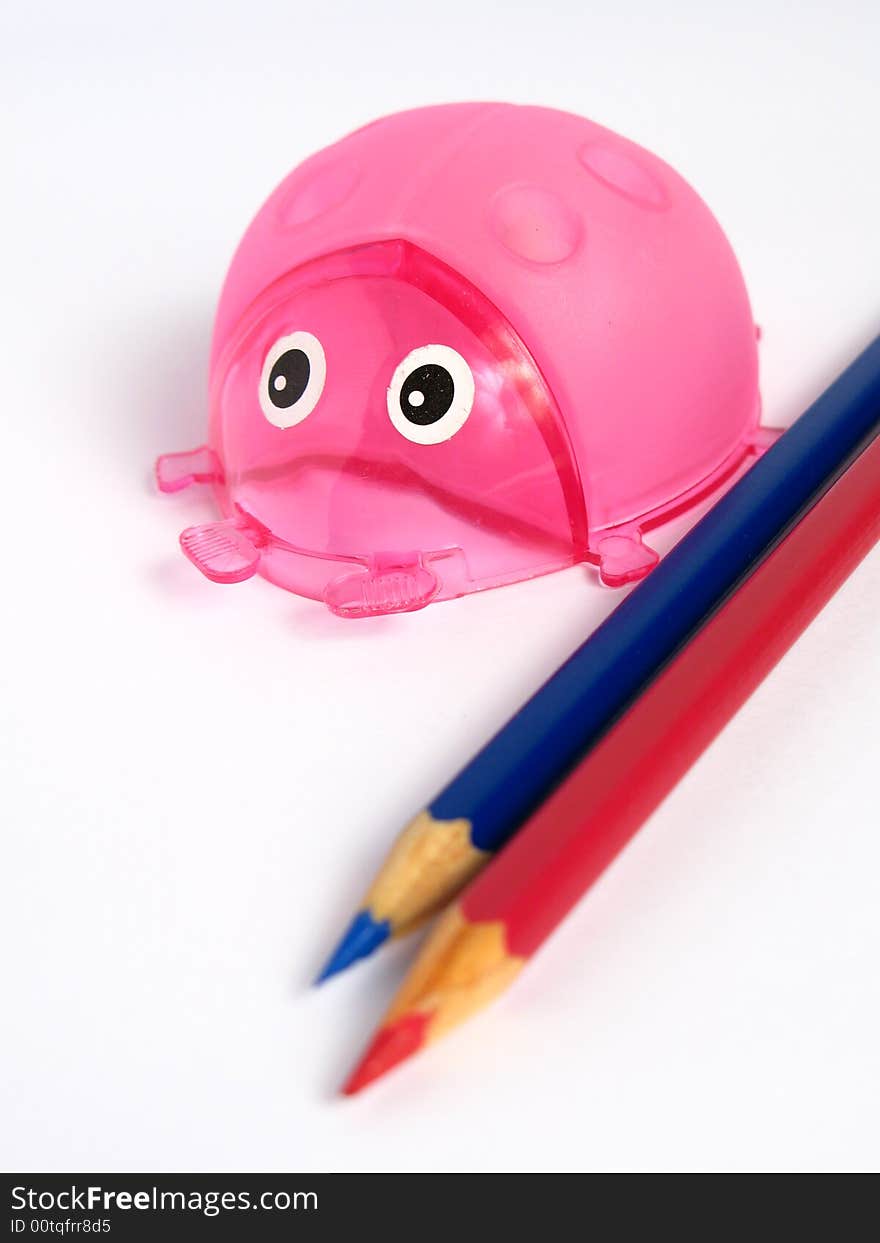 Pink Ladybug Pencil Holder, with pencils on white background