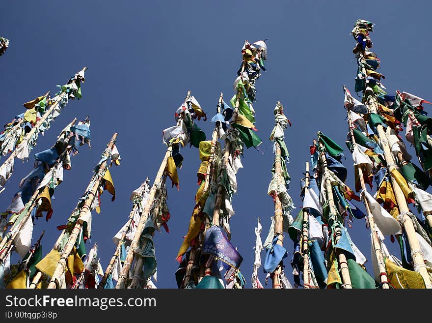 Buddhist flags on poles