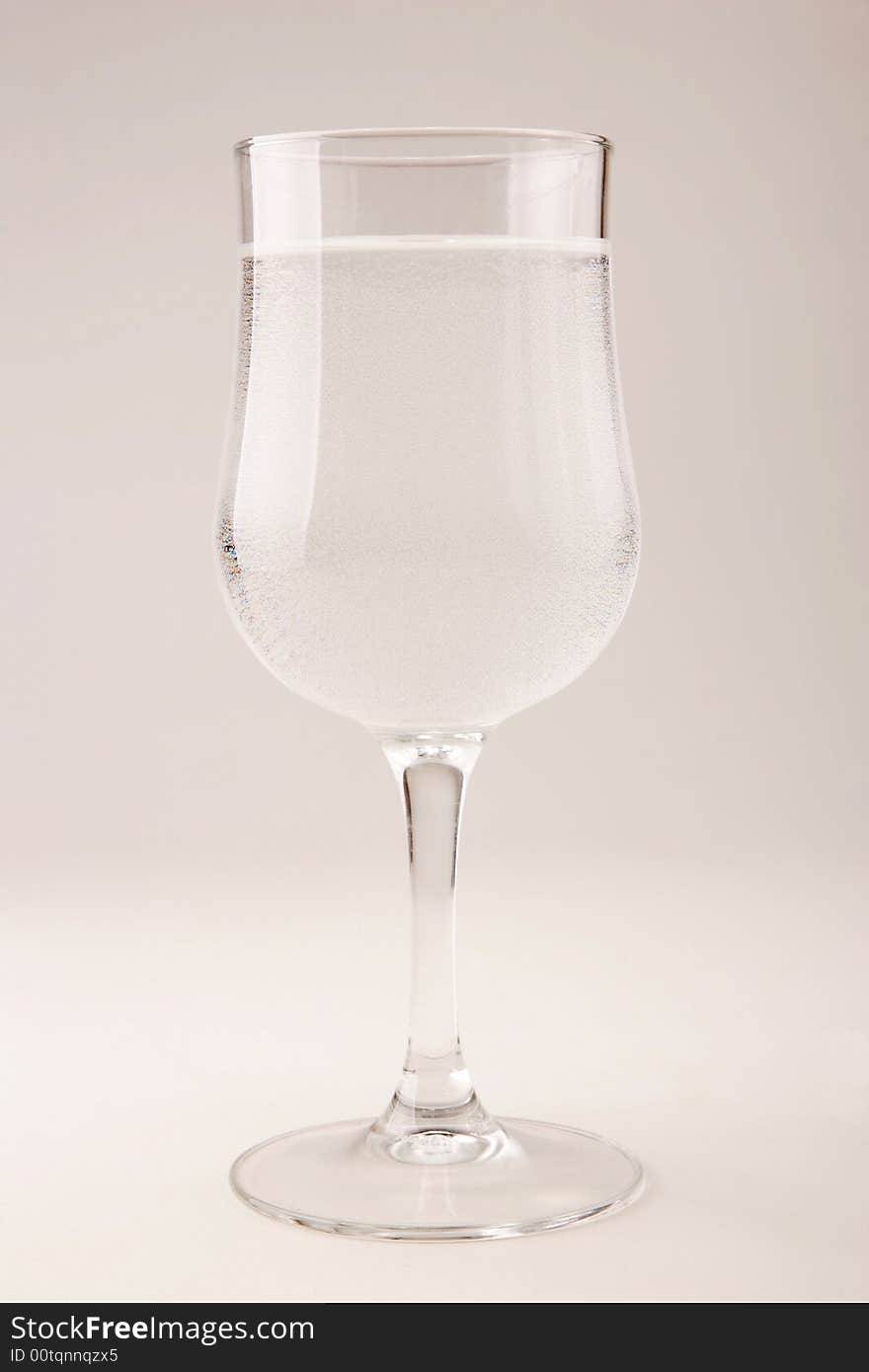 Glass goblet with water