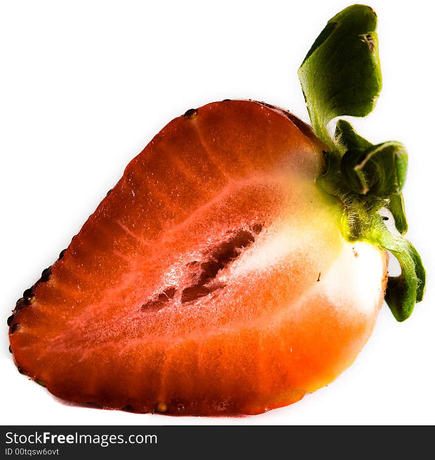 Macro of half of a strawberry, bright and isolated. Macro of half of a strawberry, bright and isolated