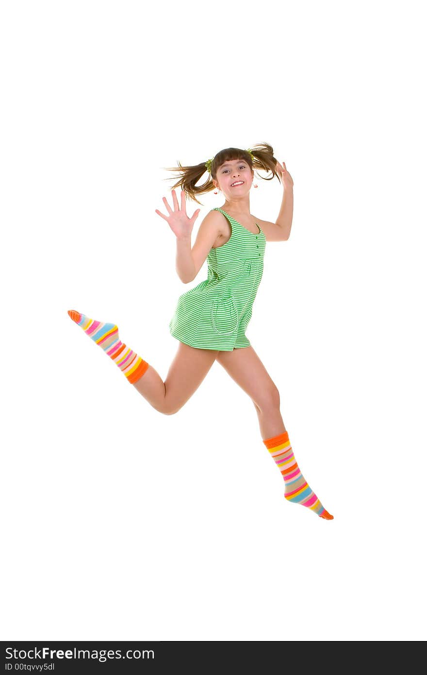 Happy girl is jumping over white background