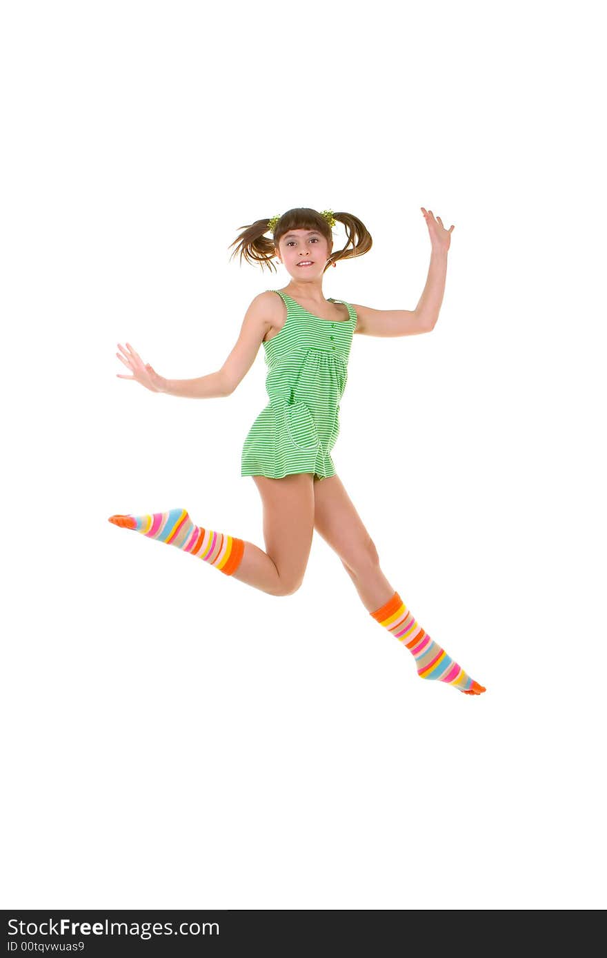 Happy girl is jumping over white background