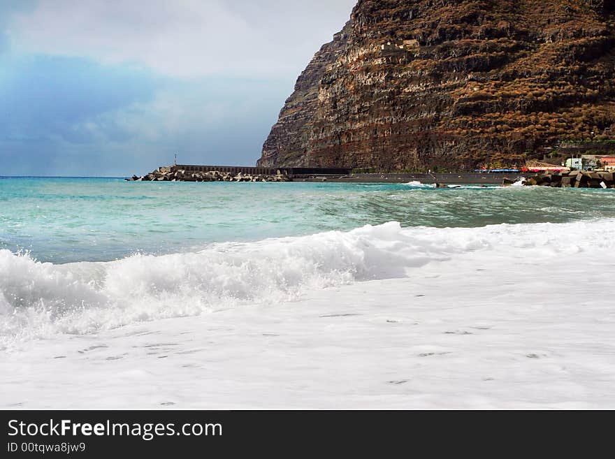 Stormy water of Atlantic ocean with alone woman. Stormy water of Atlantic ocean with alone woman