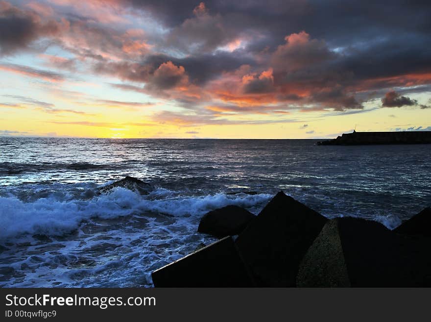 Sunset dark sky over Atlantic ocean. Sunset dark sky over Atlantic ocean