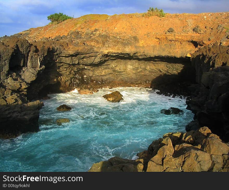 Sunset rocks and stormy water of Atlantic ocean. Sunset rocks and stormy water of Atlantic ocean