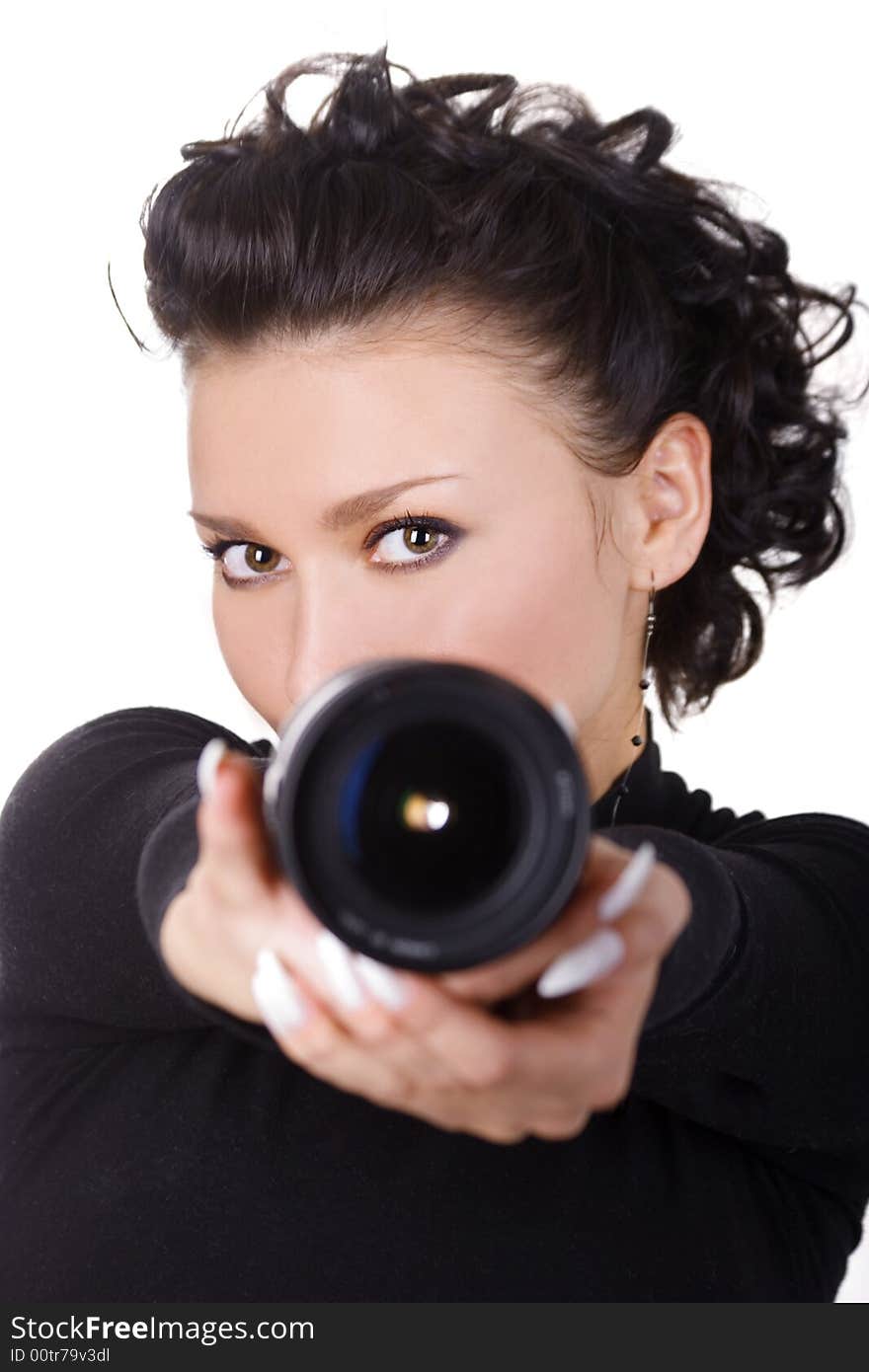 Brunette with lens over white