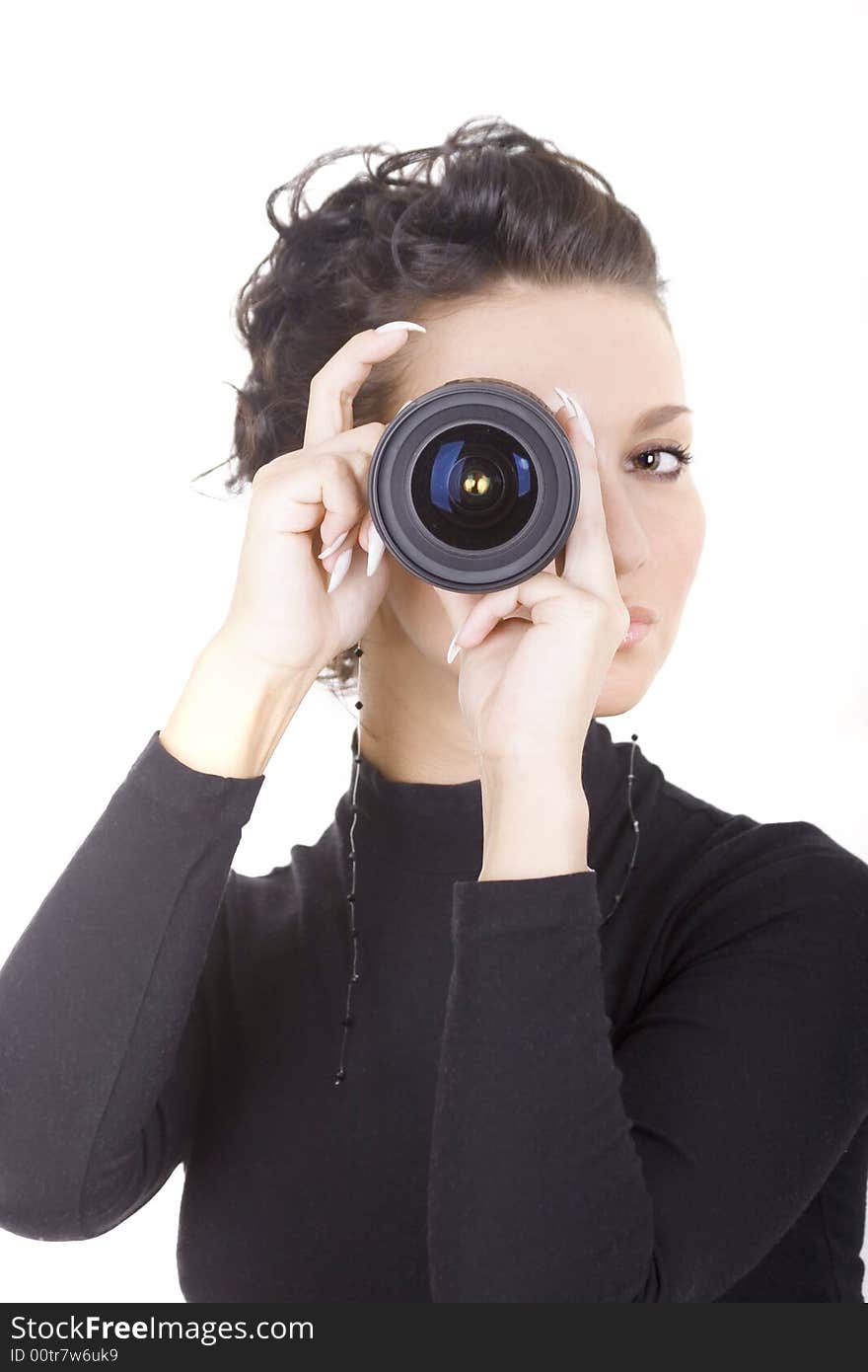 Brunette with lens over white