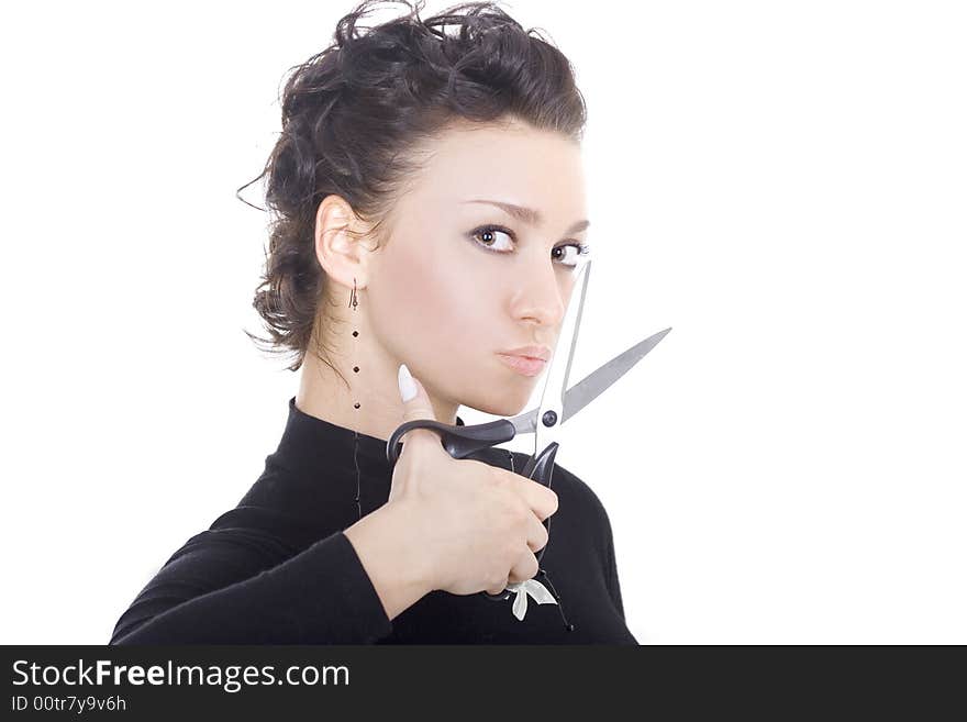 A portrait of beautiful brunette with scissors on white background. A portrait of beautiful brunette with scissors on white background