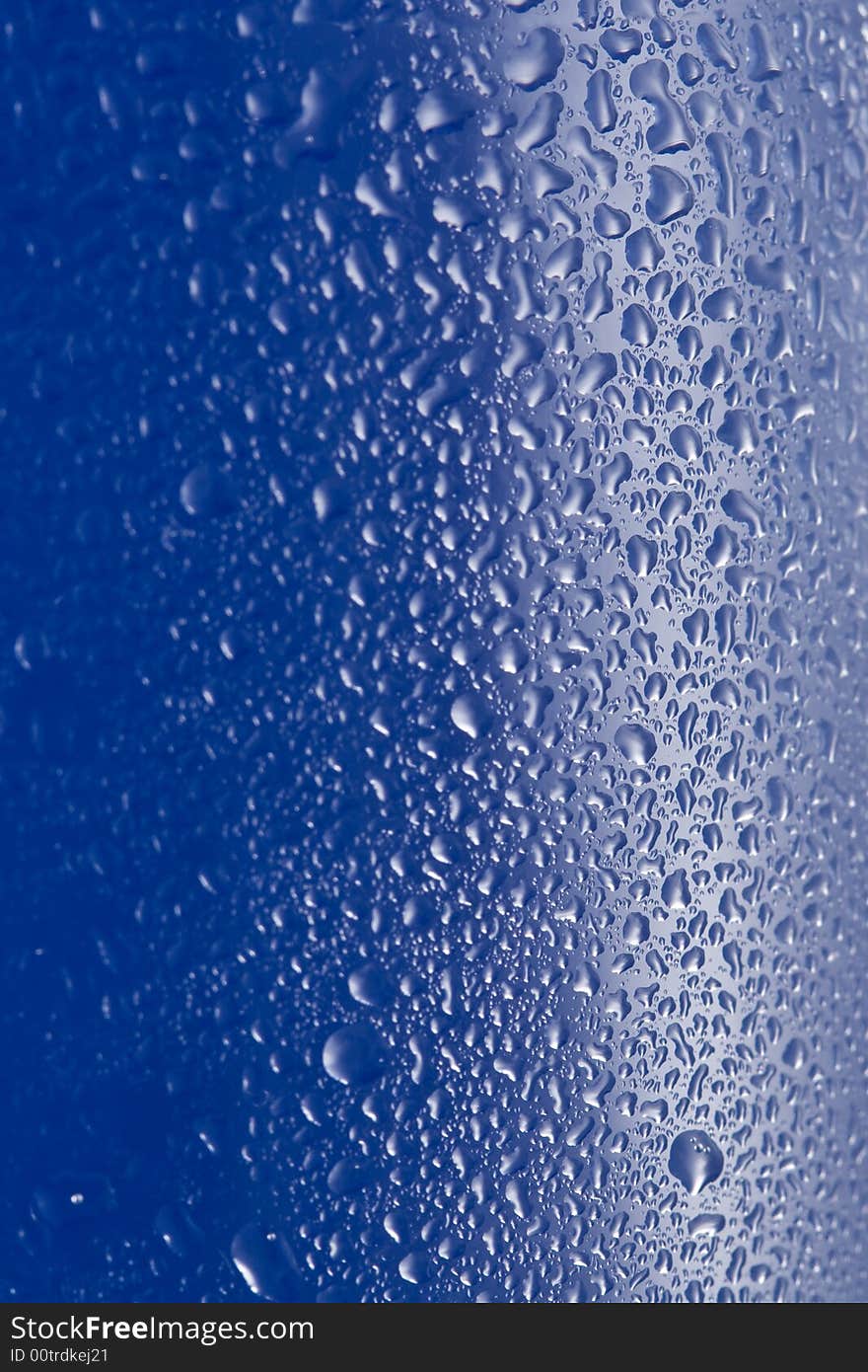 Water on blue glass