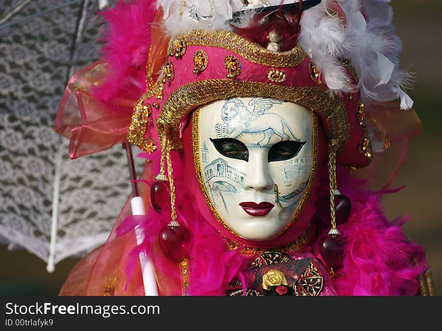 Venetian mask with umbrella