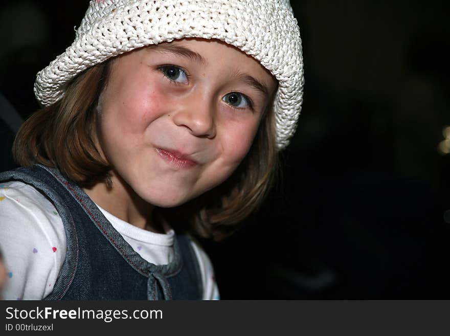 Cute Girl with a Curious Smile