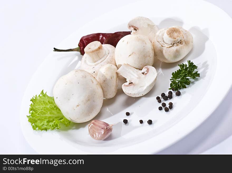 Food serias: some mushrooms on the white plate