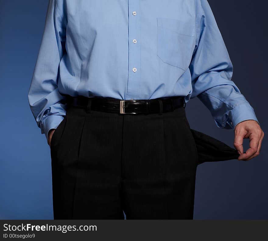 Businessman with empty black pockets. Businessman with empty black pockets