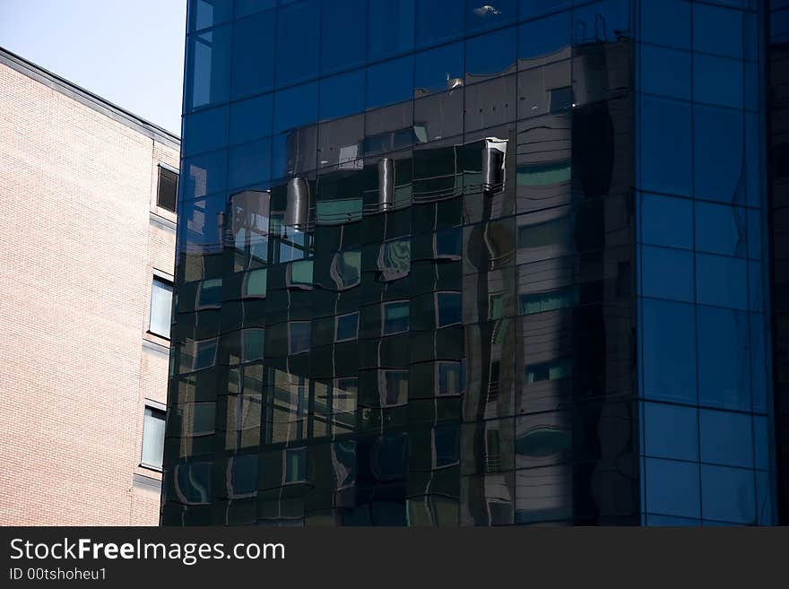 Reflection in dark business center in downtown