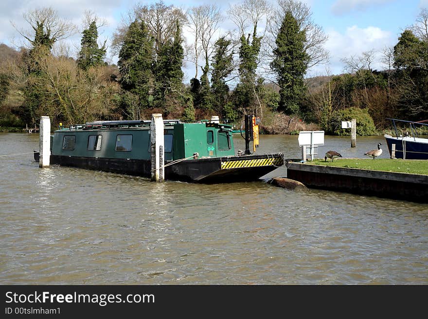 Narrowboat moored on the River Thames