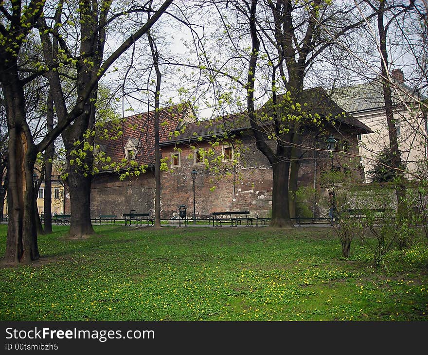 Old red home near the old park. Old red home near the old park.