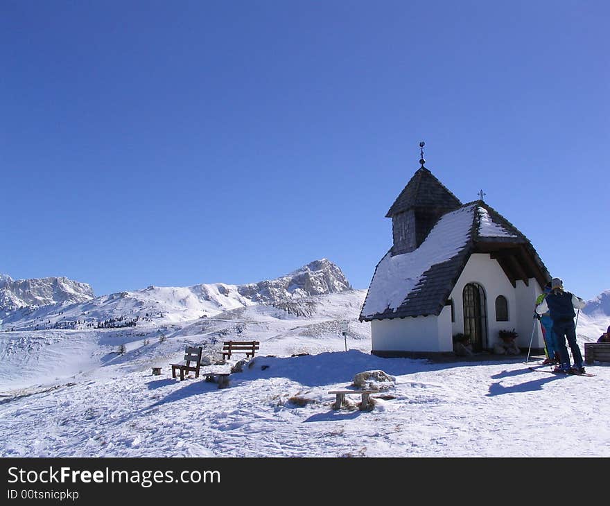 A little church at the top of a mountain in the dolomites. A little church at the top of a mountain in the dolomites