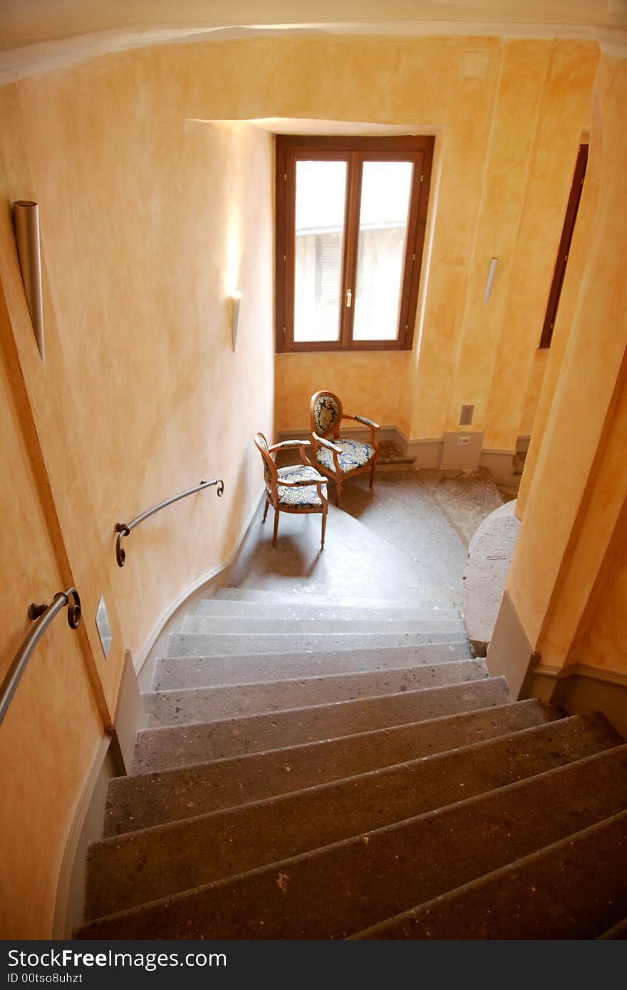 Spiral staircase of a historical building. Rome, Italy.