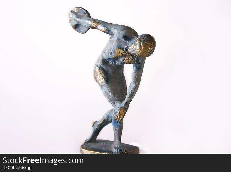 Metalic statue of greek discobolus isolated on the white background