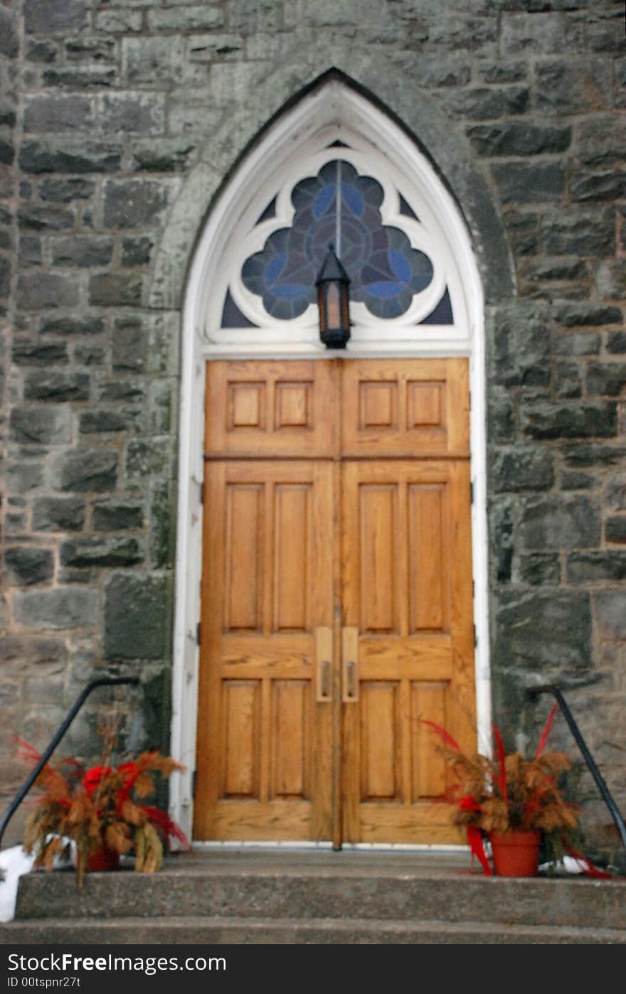 The wooden doors of a stone church built in 1863. The wooden doors of a stone church built in 1863